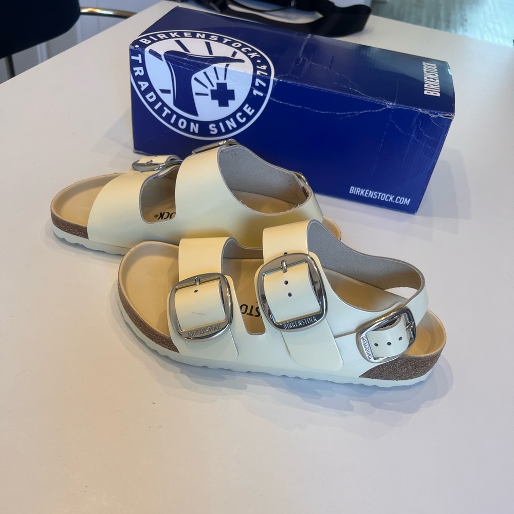 Birkenstock White Sandals with Silver Accents